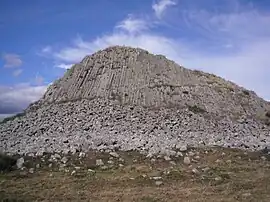 The Truc des Coucuts in Prinsuéjols, a volcanic rock with columnar basalt, which reaches a height of 1,286 m (4,219 ft)